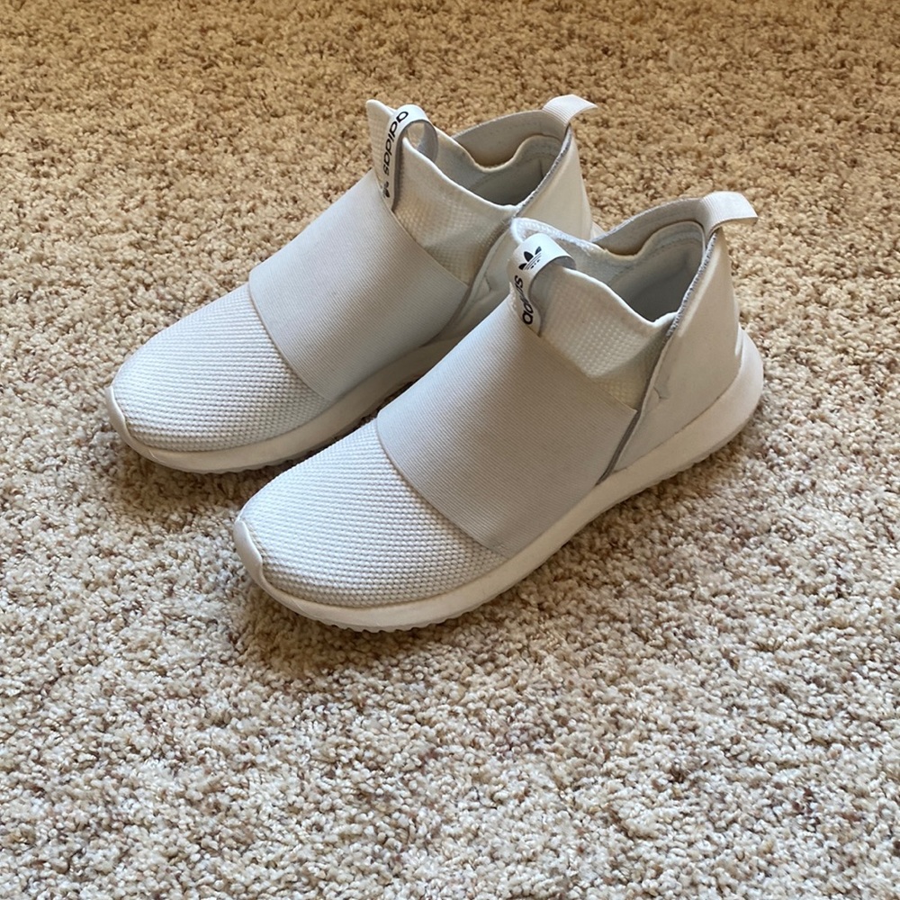 White adidas tubular sneakers